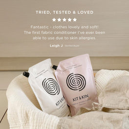 Customer review praising Kit & Kin fabric conditioner for leaving clothes soft and fresh while being safe for sensitive skin